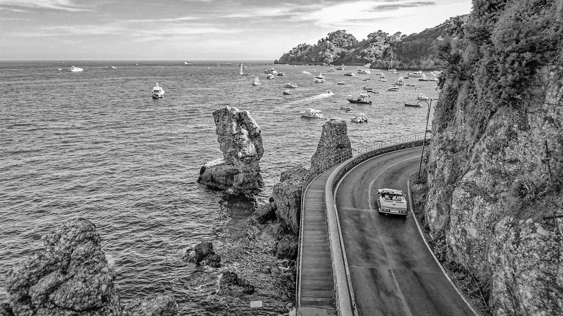 Strada costiera al tramonto, ripresa cinematografica Lapi Vision